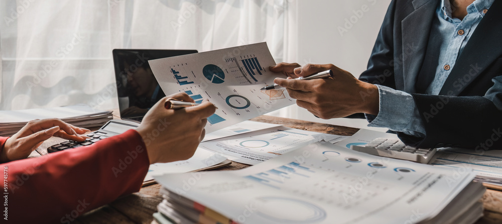 Two business people talk project strategy at office meeting room. Businessman discuss project planni