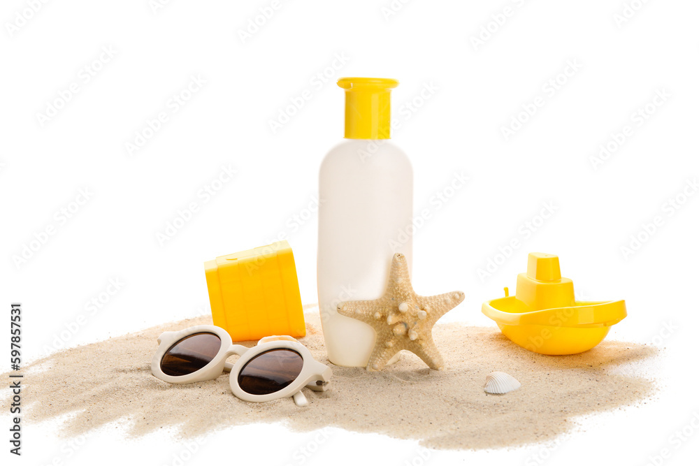 Sunscreen cream for baby with beach accessories and sand on white background