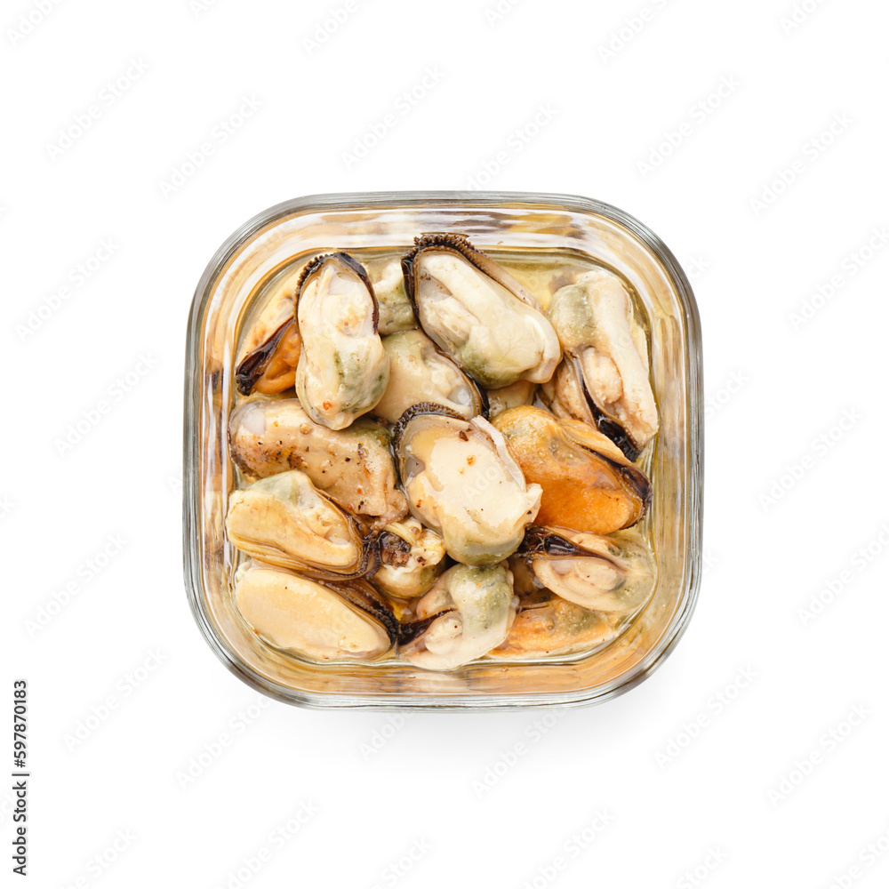 Marinated mussels in glass bowl on white background