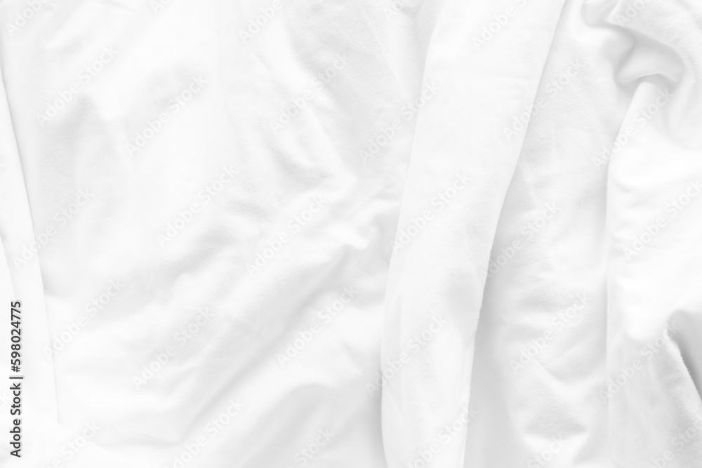 White bed sheet background, wrinkled duvet, crumpled blanket comforter cloth used in hotel, resort o