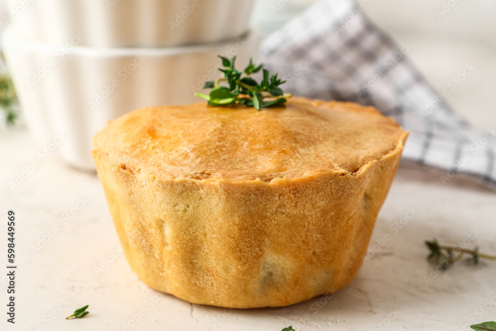 Tasty meat pot pie on light background, closeup