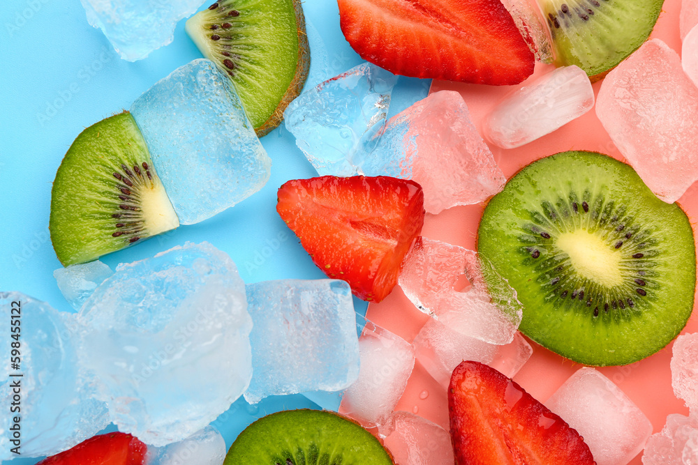 Sliced fresh kiwi with strawberry and ice on color background