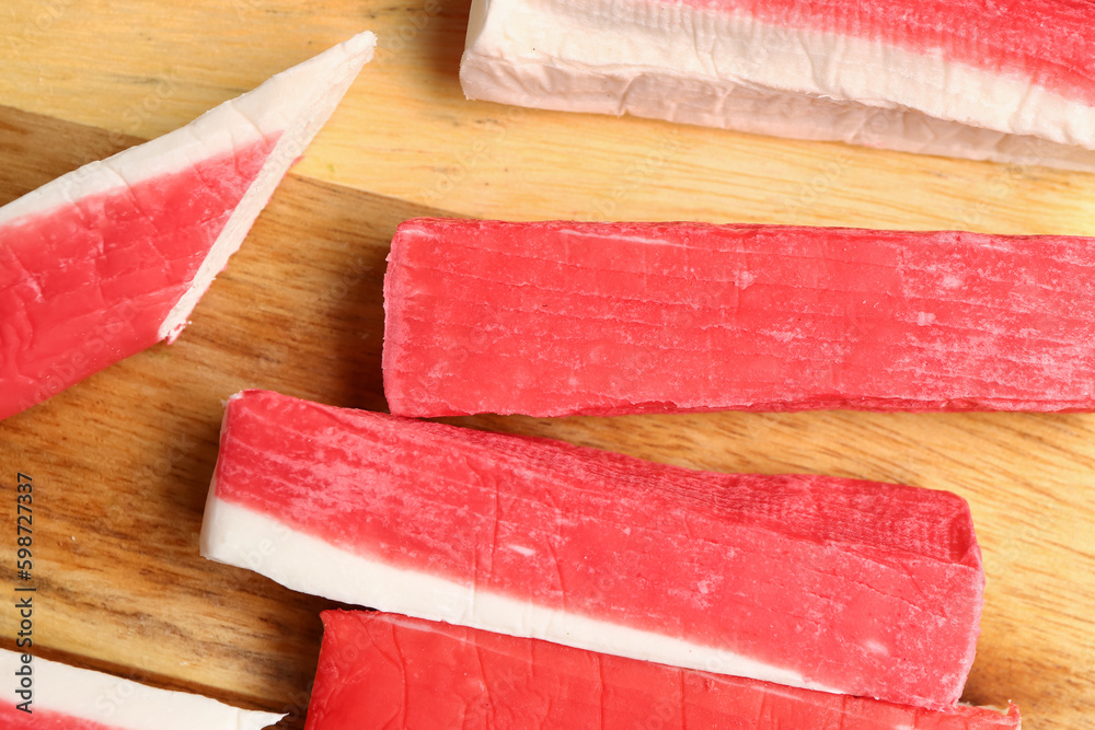 Tasty crab sticks on table, closeup