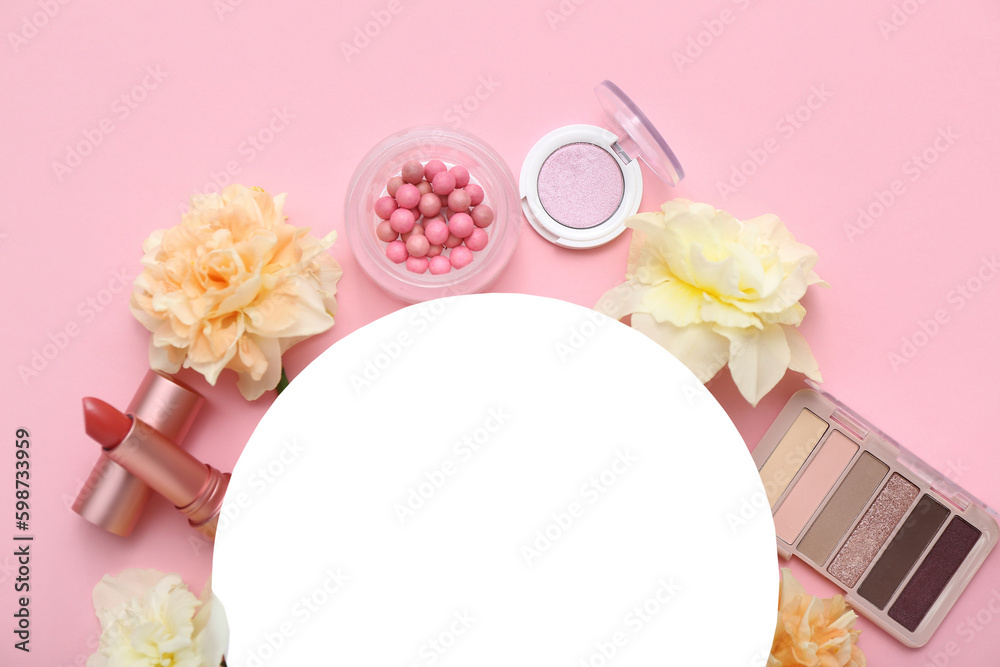 Blank card with frame made of different cosmetics and daffodils  on pink background