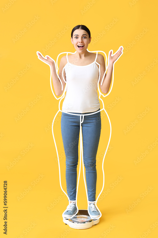 Surprised young woman after slimming standing on weight scales against yellow background