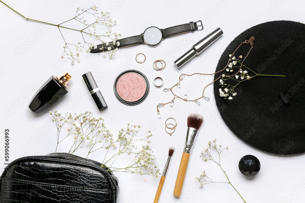 Composition with stylish female accessories, cosmetics and gypsophila flowers on white background