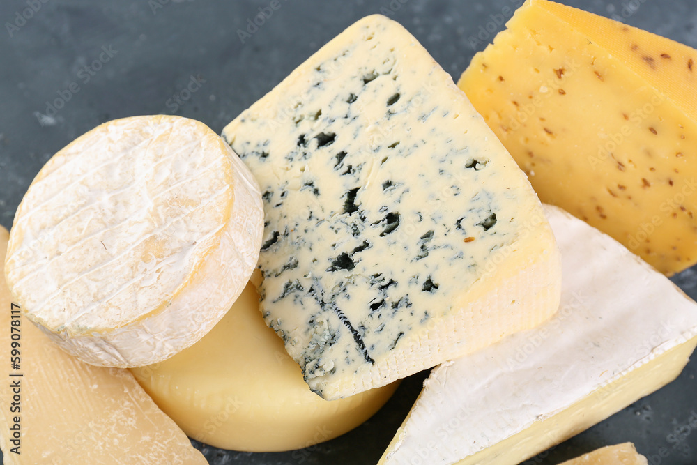 Different types of cheese on table, closeup