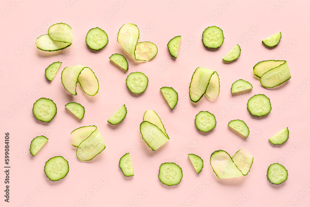 Slices of cucumber on pink background