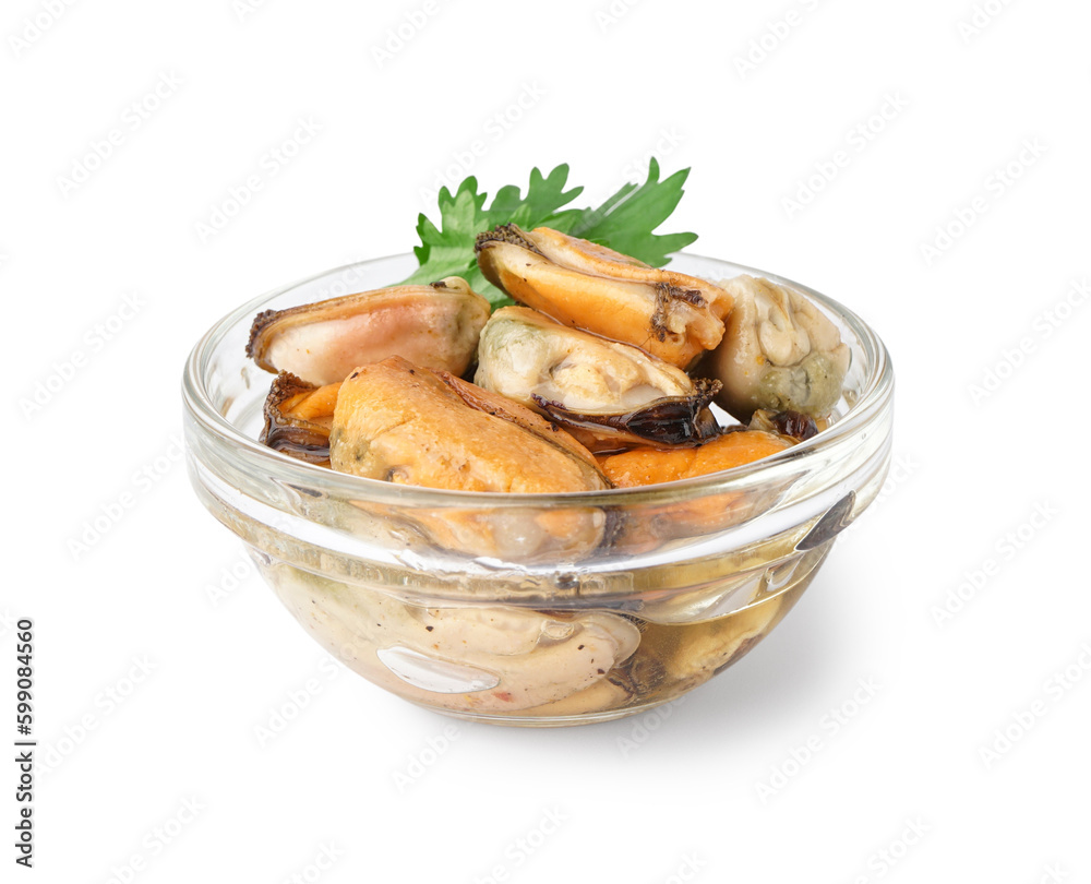 Marinated mussels with parsley in glass bowl on white background