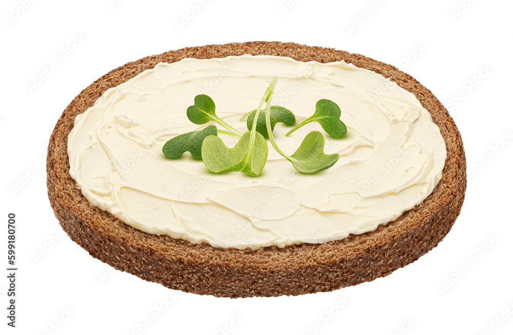 Slice of rye bread with smeared butter isolated on white background