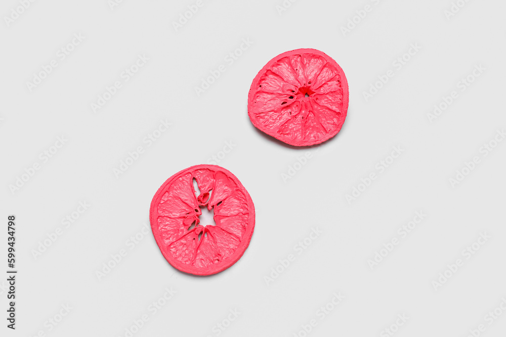 Painted orange slices on light background