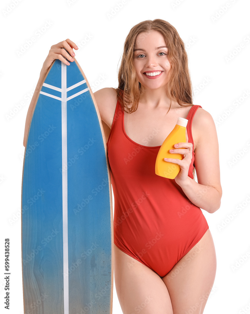 Beautiful young woman with sunscreen cream and surfboard on white background