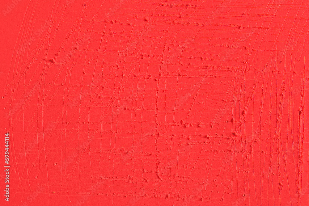 Coral color scratched wall as background