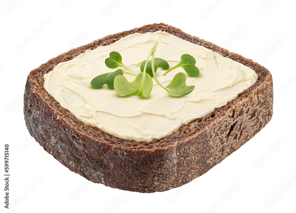 Slice of rye bread with smeared butter isolated on white background