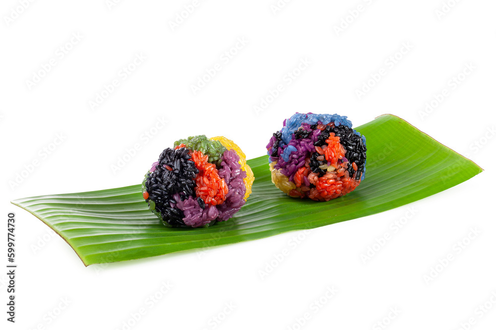 colorful sticky rice on a banana leaf in white background.