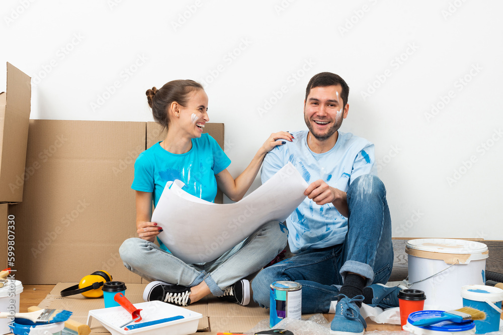 Young man and woman planning home renovation