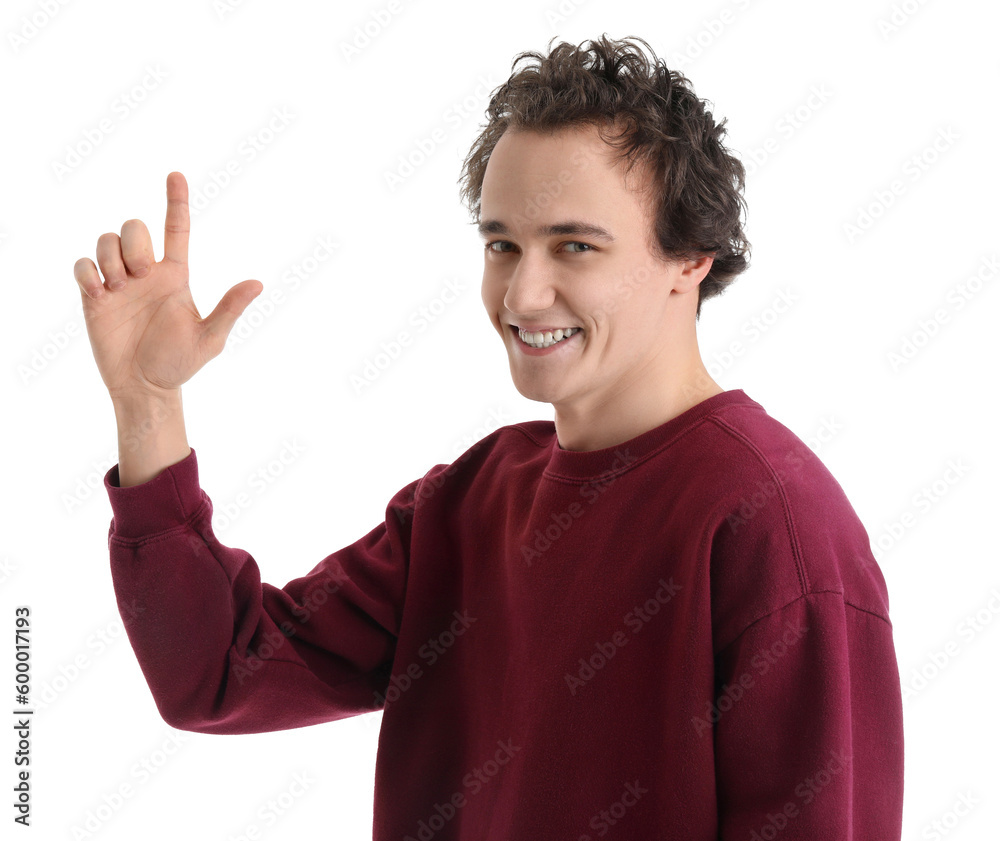 Young man showing loser gesture on white background