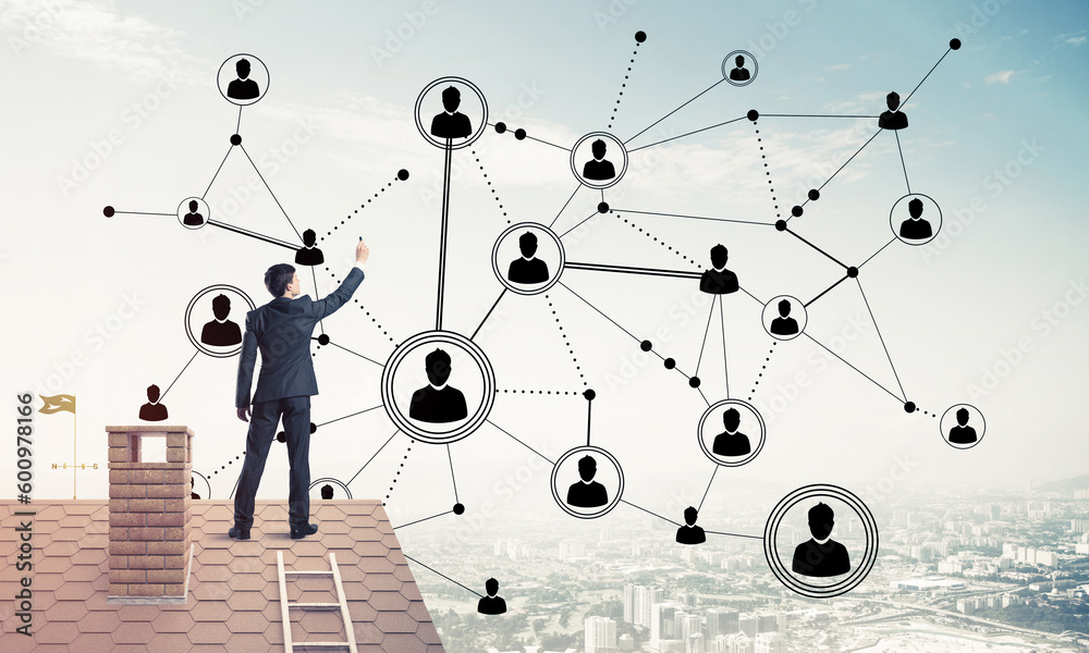 Businessman on house roof presenting networking and connection c