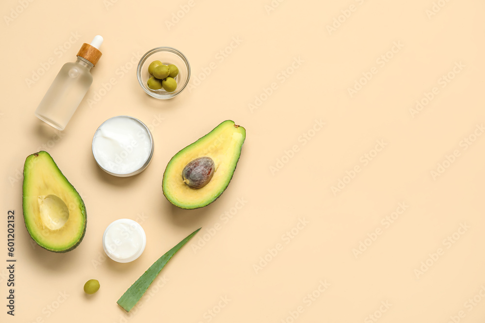 Composition with natural cosmetics, avocado, olives and aloe leaf on color background