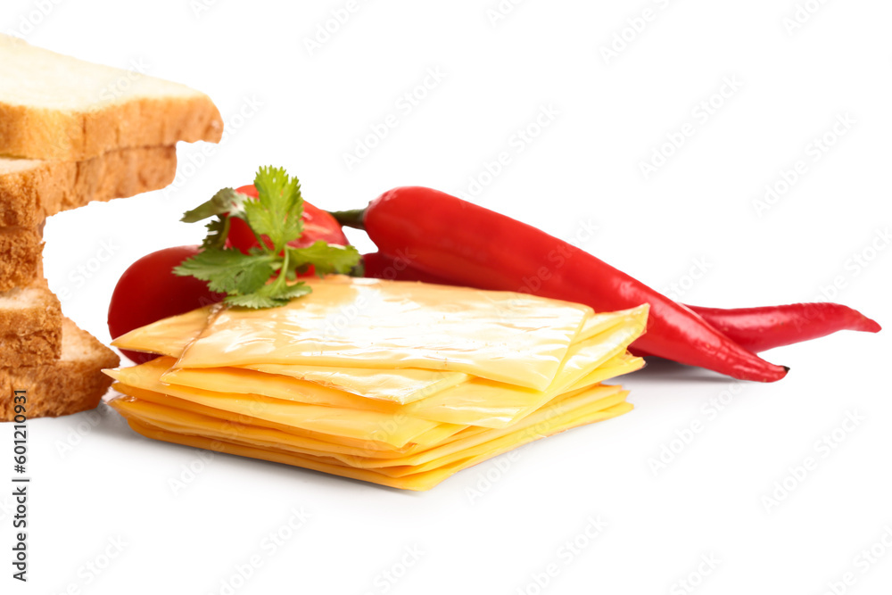 Slices of tasty processed cheese with vegetables and bread on white background