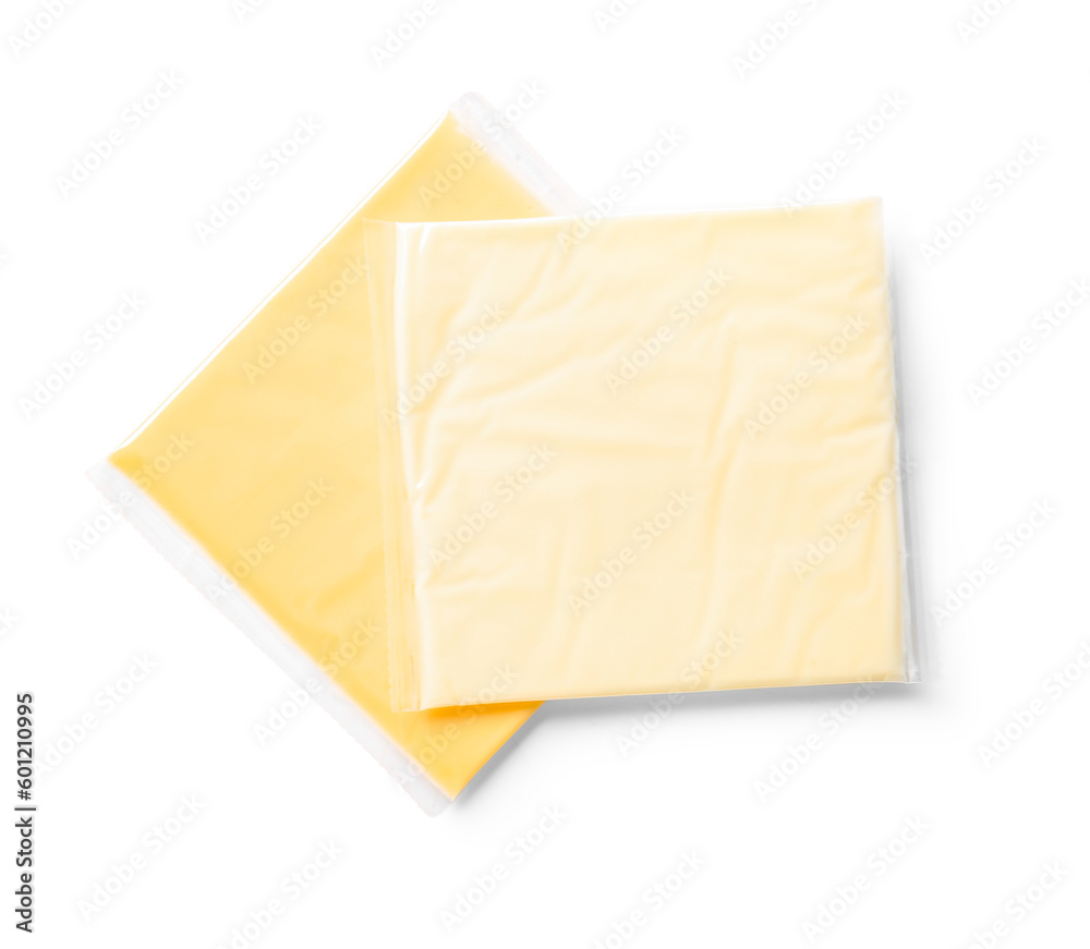 Slices of tasty processed cheese on white background