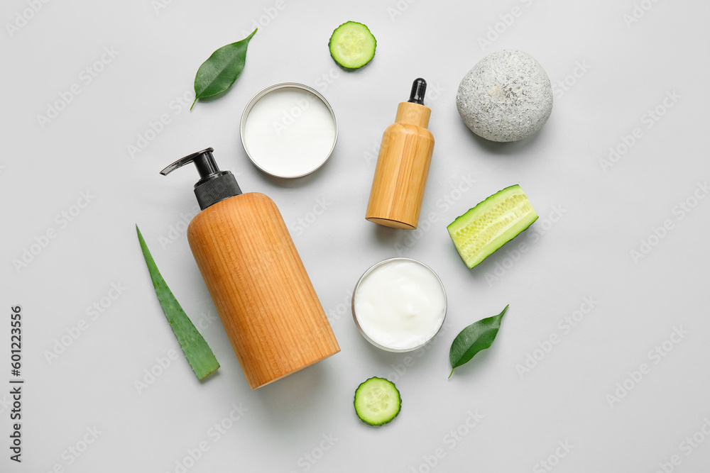 Composition with natural cosmetic products and ingredients on light background