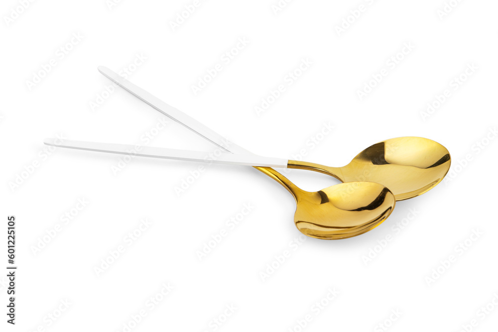 Golden spoons on white background