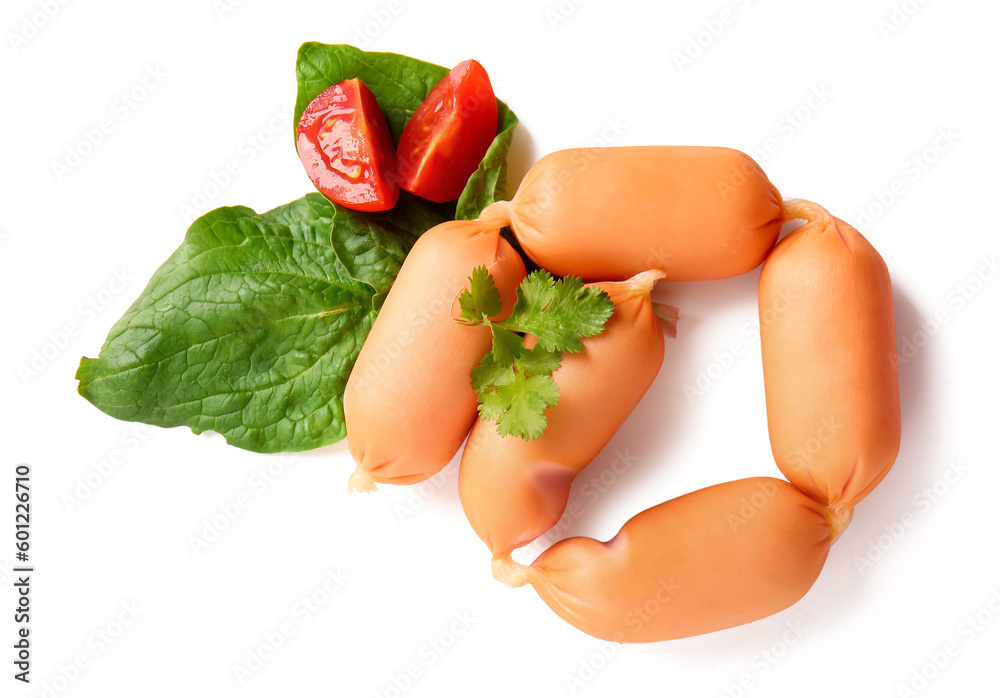 Tasty boiled sausages with parsley, tomato and spinach on white background