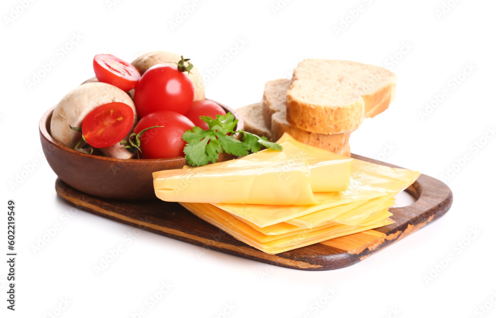 Board of tasty processed cheese with vegetables and bread on white background