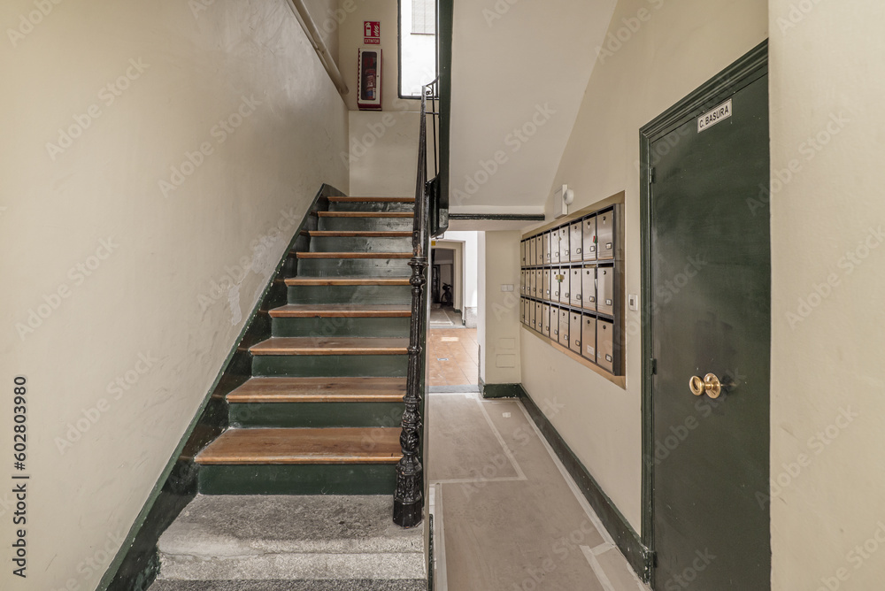 Stairs of wooden steps inside a vintage building