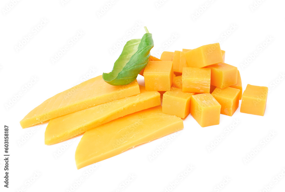 Pieces of tasty cheddar cheese on white background