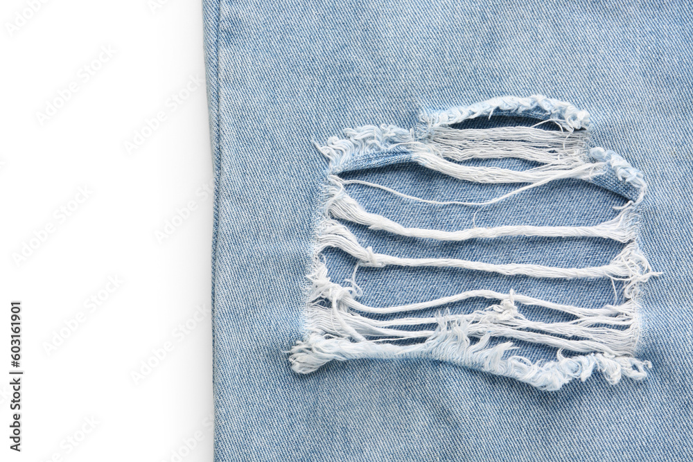 Stylish blue denim jeans on white background