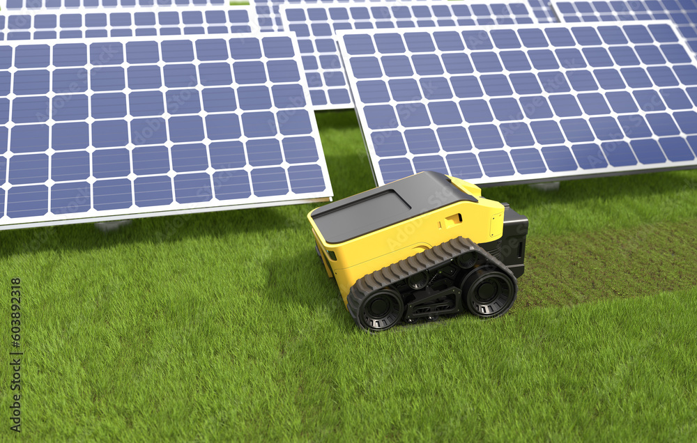 The automatic lawn mower is mowing the grass at the solar panel.