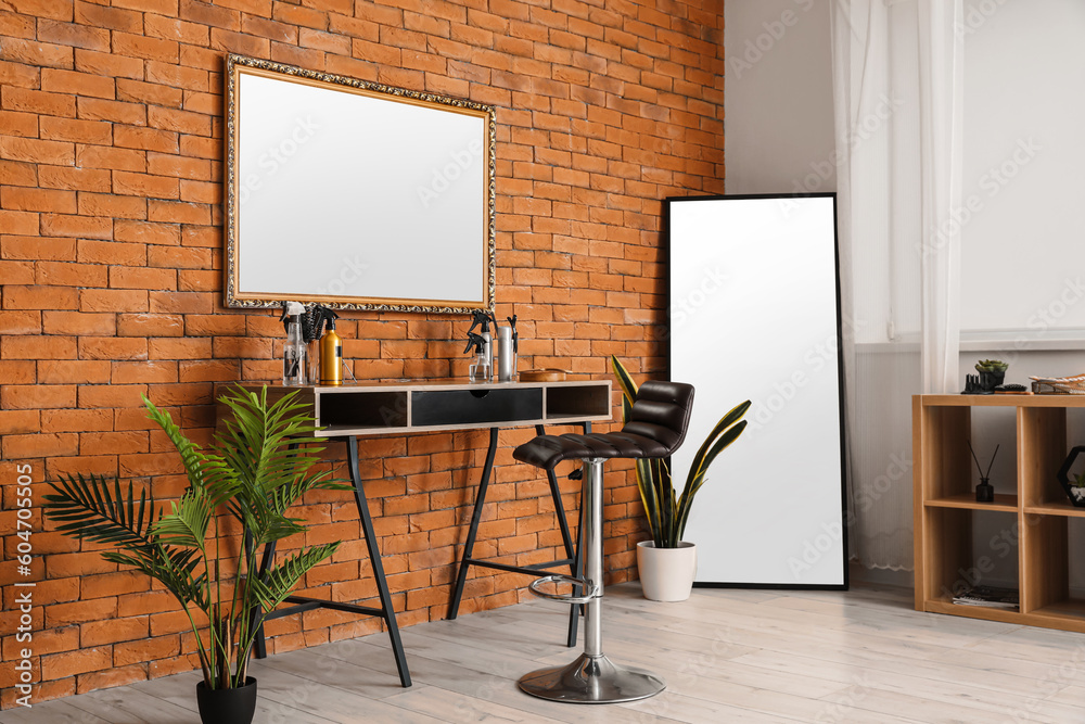 Interior of beauty salon with hairdressers workplace