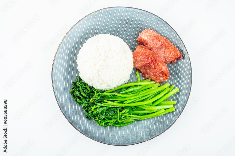 Chinese style meal for one with rice, steamed pork and stir-fried vegetables