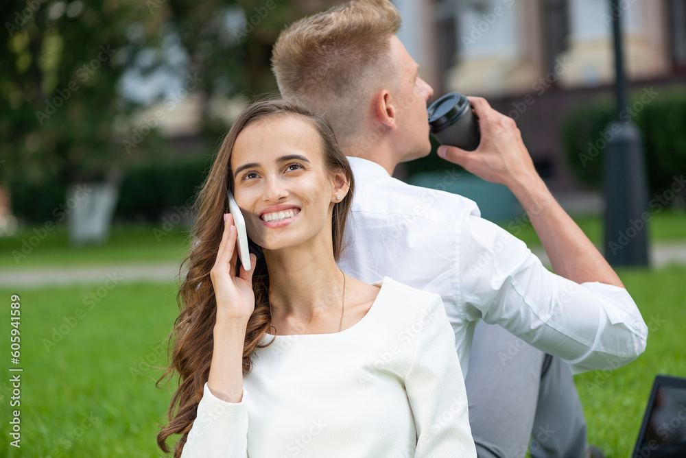 Young attractive woman talking on the phone