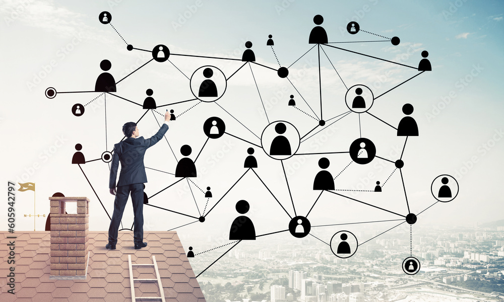 Businessman on house roof presenting networking and connection c