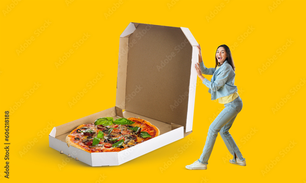 Cardboard box with tasty pizza on white background