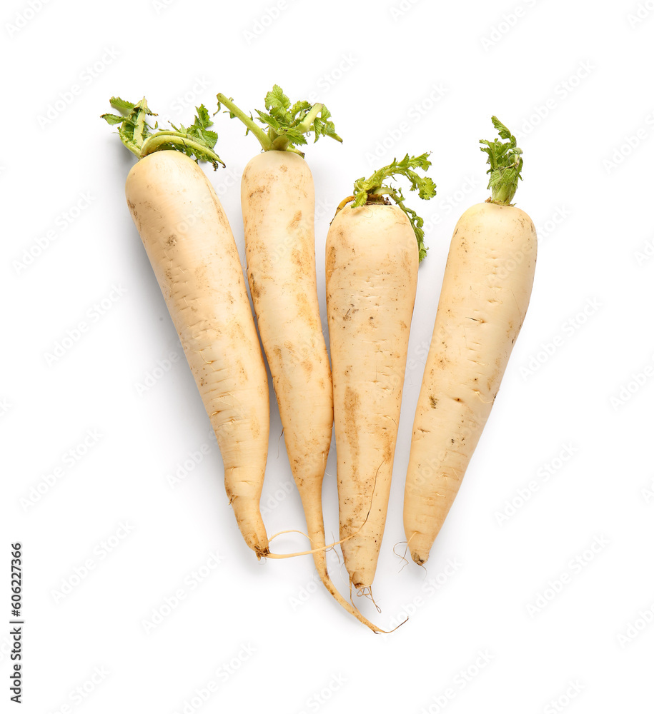 Fresh daikon radishes on white background