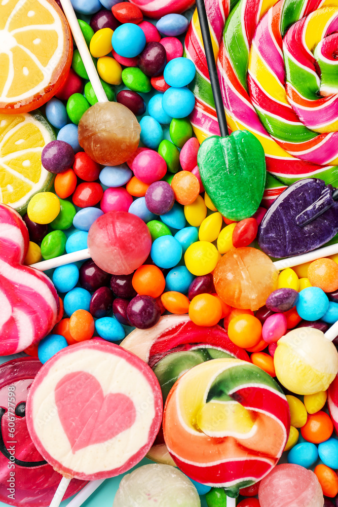 Sweet lollipops and candies as background, closeup