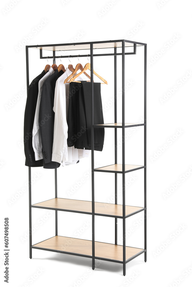 Shelving unit with male clothes on white background