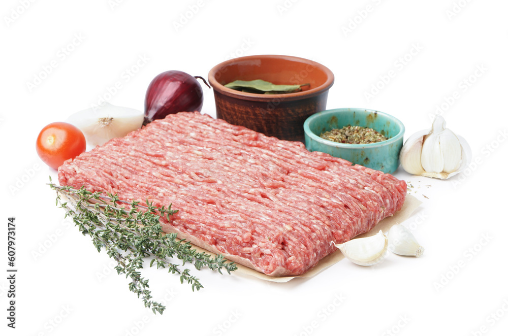 Board with fresh minced meat with tomatoes, onions, garlic and spices isolated on white background