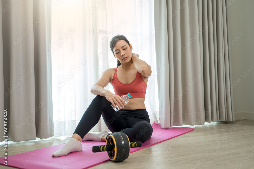 Young woman practicing yoga at home,Enjoying domestic fitness training and healthy lifestyle.