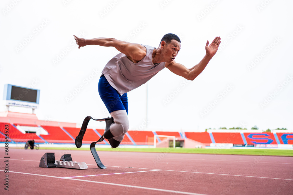 Asian para-athletes disabled with prosthetic blades running at stadium