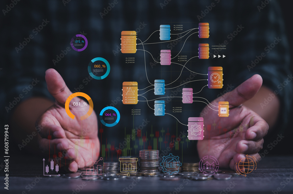 Businessman using tablet showing business growth holding graph and technology symbols