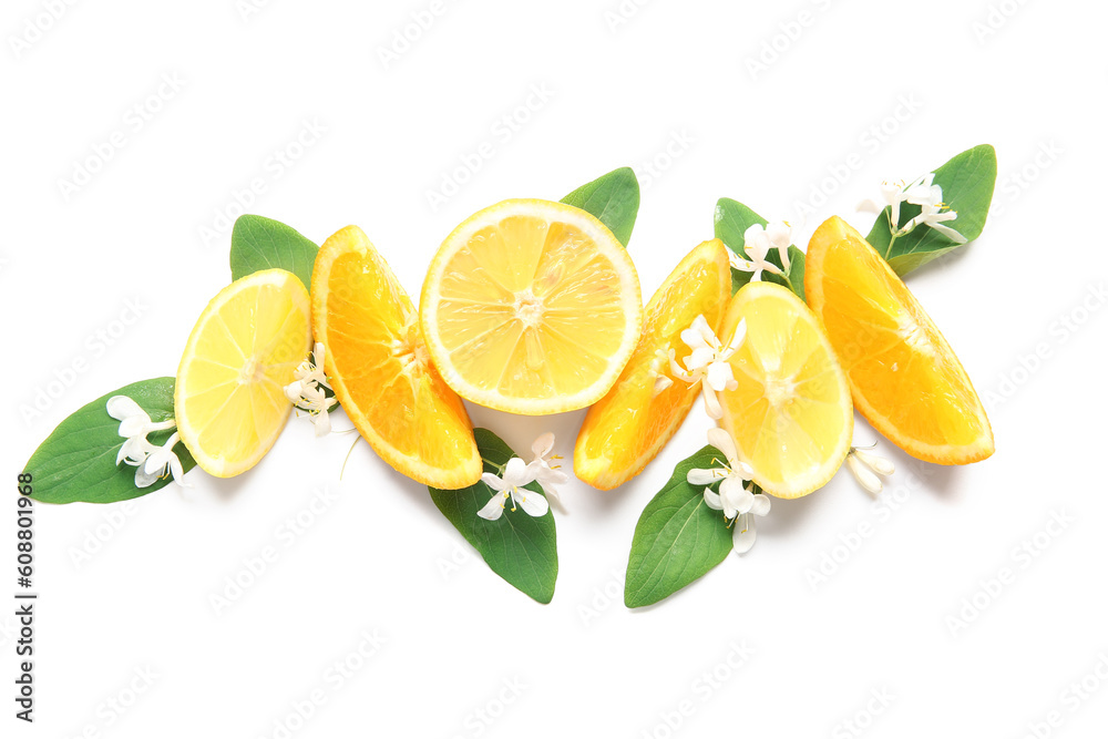 Delicious ripe lemons and flowering branches on white background