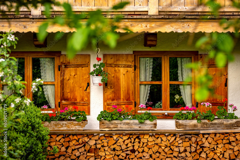 Window with wooden shutters of an old Bavarian house