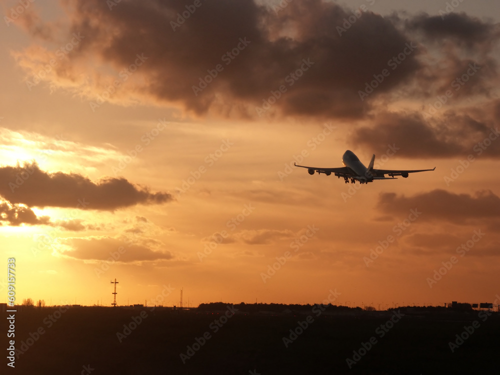 Cloudy Sunrise take-off for a tropical destination.