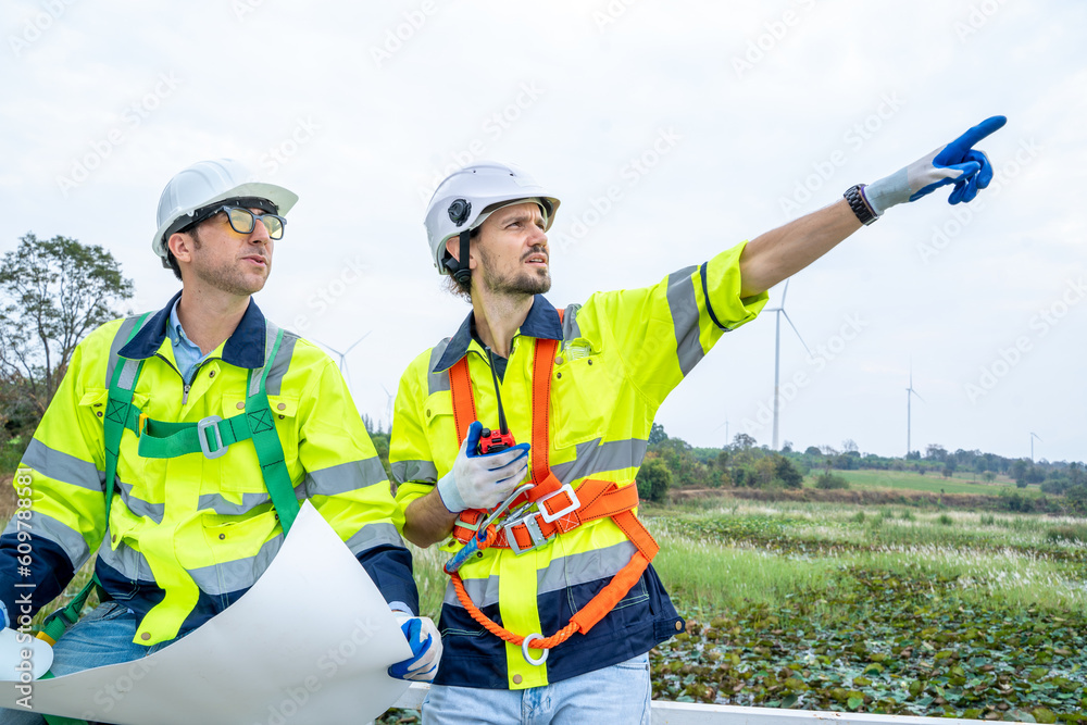 Engineers inspection wind energy generation,Wind turbine farm generator by alternative green energy.