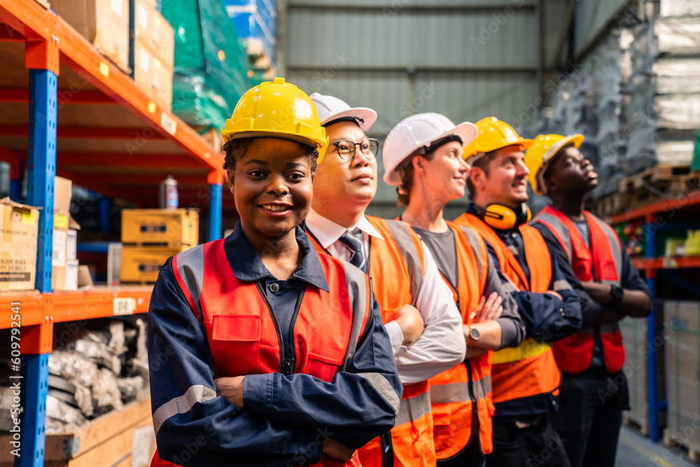 Portrait group of diverse industry worker working in factory warehouse. 